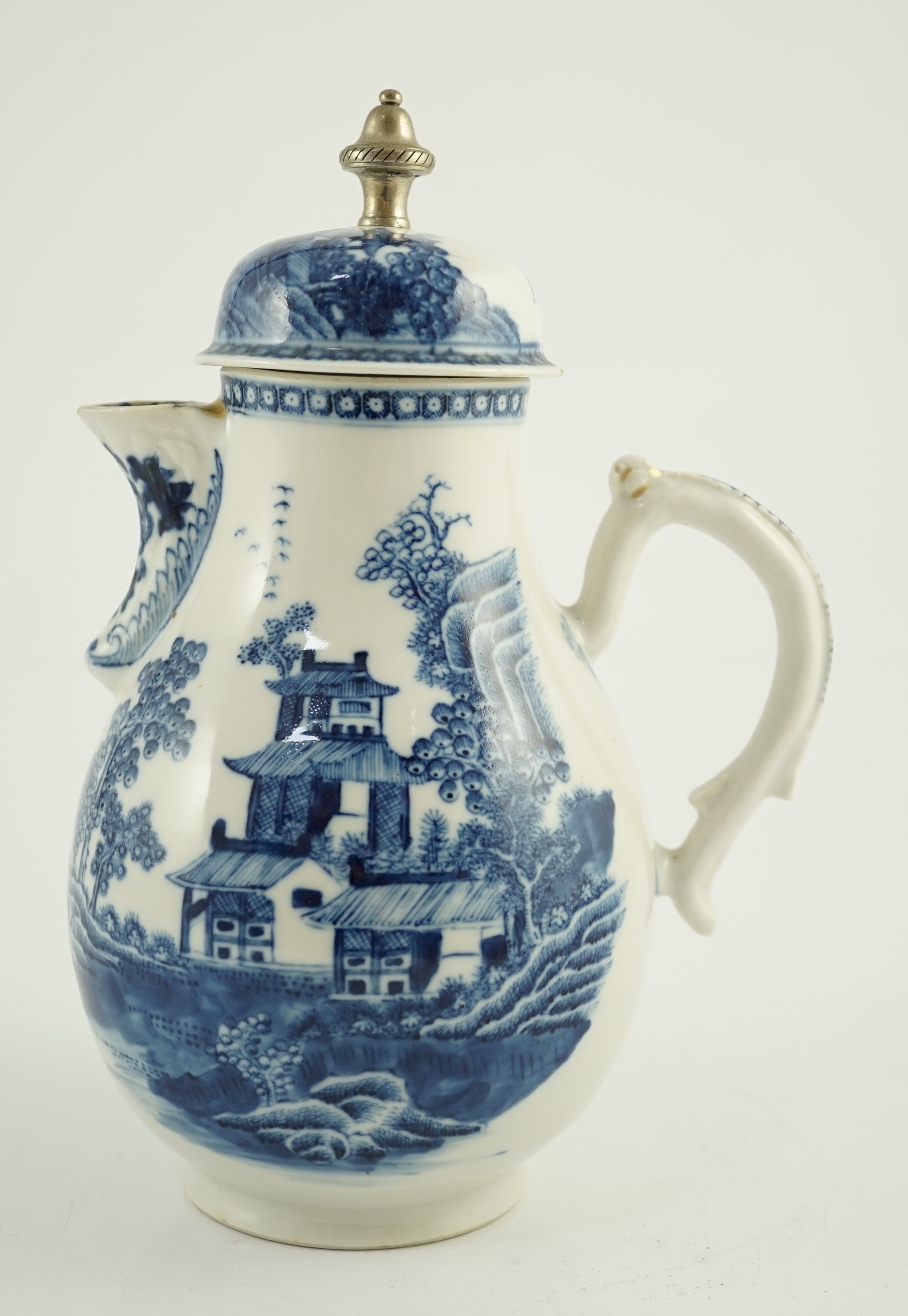 A Chinese blue and white jug and cover, Qianlong period, later metal finial